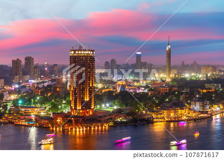 Sunset sky in the beautiful evening view of the Nile and Cairo, Egypt Sunset sky in the beautiful evening view of the Nile and Cairo, Egypt 107871617
