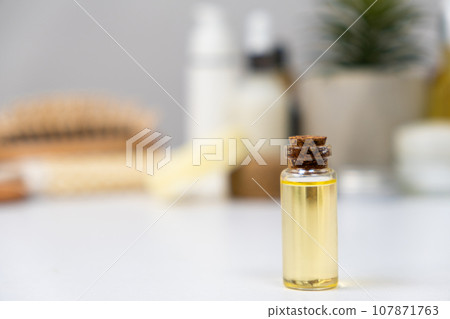 Natural essential oil for facial skin and hair care 107871763