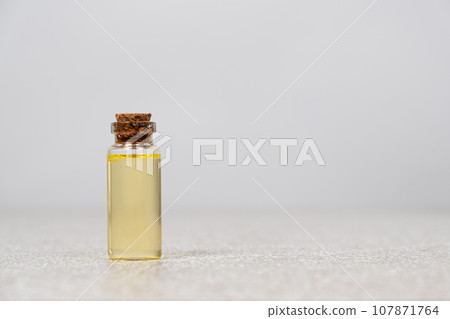Natural essential oil for facial skin and hair care Natural essential oil for facial skin and hair care 107871764