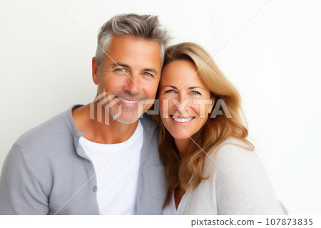 Smiling Middle Age Couple Smiling Middle Age Couple 107873835