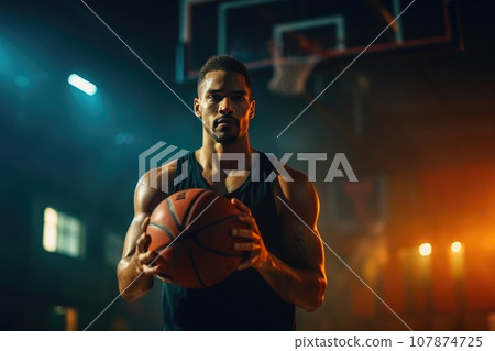 Focused Hoopster Grasping Basketball 107874725