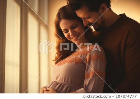 Love in Bloom: Happy Pregnant Couple Embracing Love in Bloom: Happy Pregnant Couple Embracing 107874777