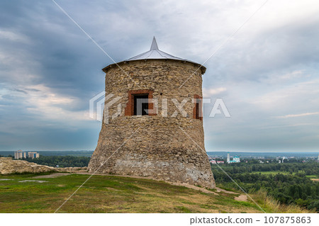 One of the towers of the ancient fortress of the ancient Bulgarian Yelabuga settlement and view of the city in the Republic of Tatarstan, Russia 107875863