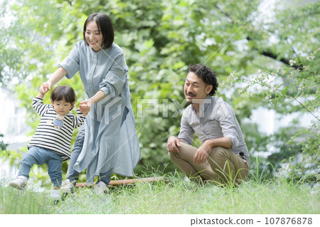 Happy Asian (Japanese) family playing in the park Image of spring and summer in the fresh green season 107876878