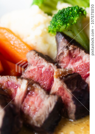 Beef, tender thick-sliced steak marinated in red wine Beef, tender thick-sliced steak marinated in red wine 107878850