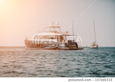 yacht on calm sea. Luxury cruise trip. View from above of white 107880318