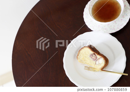 Maron cake on a silo plate Maron cake on a silo plate 107880859