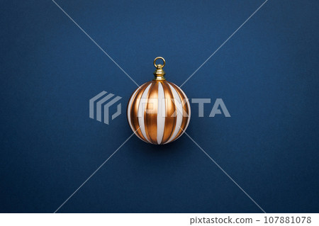 Simply minimal composition winter object ornament ball on color background 107881078