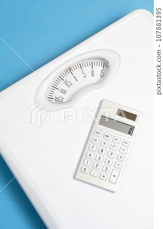Weight scale and calculator diet image Weight scale and calculator diet image 107881395