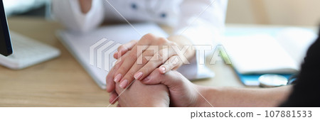 Doctor supports patient after revealing severe diagnosis 107881533