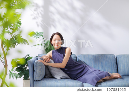 A woman relaxing on the sofa 107881935