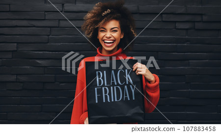 Woman with Black Friday Bag Woman with Black Friday Bag 107883458