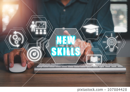 New skills concept, Businessman hand touching new skills icon on virtual screen. 107884428