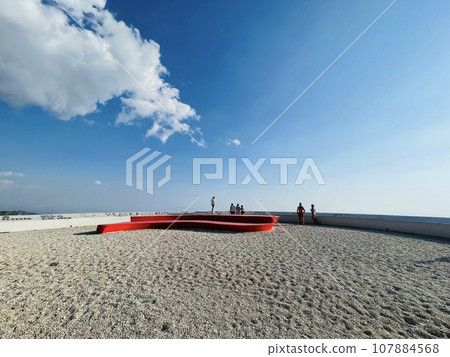 Tourists taking pictures scenic view from Llogara pass mountains. 107884568