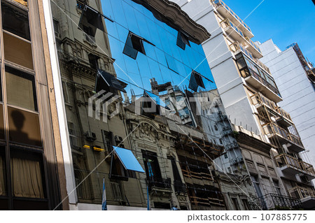 Skyscraper glass facades on a bright sunny day and blue sky. Modern buildings of Buenos Aires, Argentina Skyscraper glass facades on a bright sunny day and blue sky. Modern buildings of Buenos Aires, Argentina 107885775