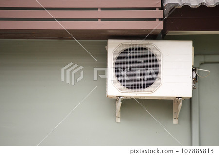 Air condition outdoor unit compressor install outside house 107885813