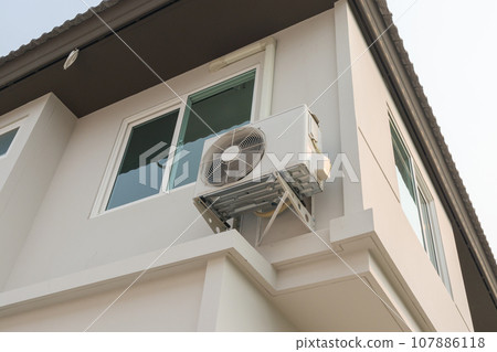 Air condition outdoor unit compressor install outside the house 107886118