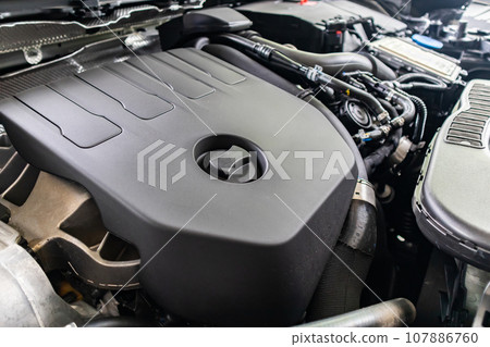 modern car engine under hood close up detail 107886760