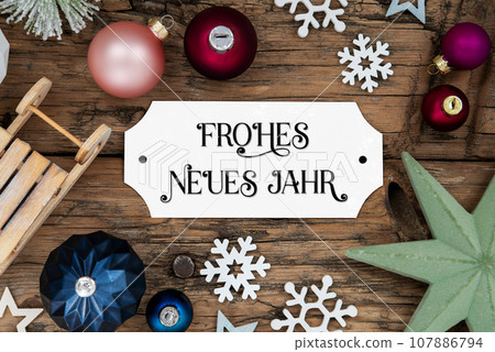 Christmas Decoration With White Sign With German Text Frohes Neues Jahr 107886794