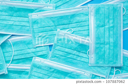 Blue surgical face mask texture background protection against air pollution and COVID-19 coronavirus. Healthcare and medical concept 107887062