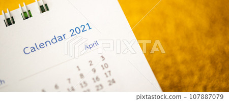 Happy new year 2021 calendar page close up on gold glitter sparkle background 107887079