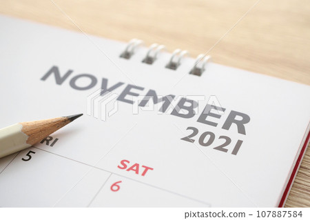 November month on 2021 calendar page with pencil business planning appointment meeting concept 107887584