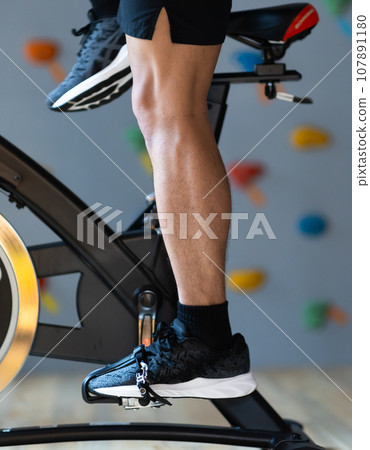 young man training his body at the gym young man training his body at the gym 107891180