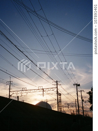sunset with electric wires sunset with electric wires 107891401
