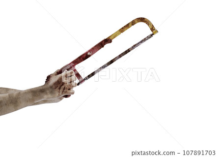The hand of a scary zombie with blood and wounds carrying a saw The hand of a scary zombie with blood and wounds carrying a saw 107891703