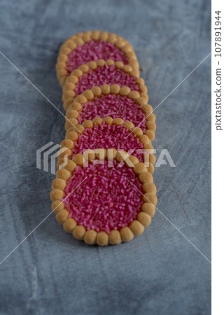 Cookies on a grey background 107891944