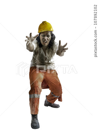 A scary construction worker zombie with blood and wounds on his body walking 107892102