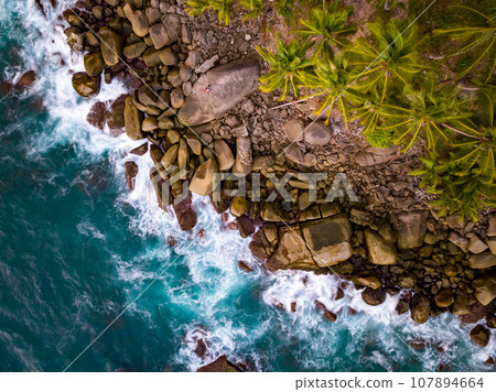 Aerial view seashore with mountains at Phuket Thailand, Beautiful seacoast view at open sea in summer season, Nature recovered Environment and Travel background Aerial view seashore with mountains at Phuket Thailand, Beautiful seacoast view at open sea in summer season, Nature recovered Environment and Travel background 107894664