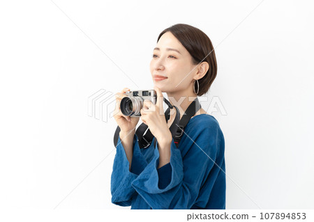 A woman with a camera A woman with a camera 107894853