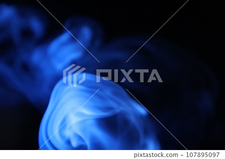 blue smoke on a dark background, colourful abstract 107895097