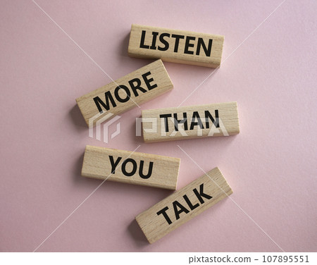 Listening skills symbol. Concept words Listen more than you Talk on wooden blocks. Beautiful pink background. Business and Listen more than you Talk concept. Copy space Listening skills symbol. Concept words Listen more than you Talk on wooden blocks. Beautiful pink background. Business and Listen more than you Talk concept. Copy space 107895551