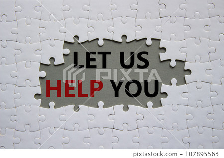 Let us help you symbol. White puzzle with words Let us help you. Beautiful grey background. Business and Let us help you concept. Copy space. 107895563