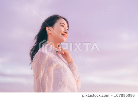 Beauty image with sunset background 107896096