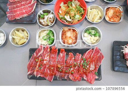 raw beef , sliced beef or beef for cook and Korean salad raw beef , sliced beef or beef for cook and Korean salad 107896556