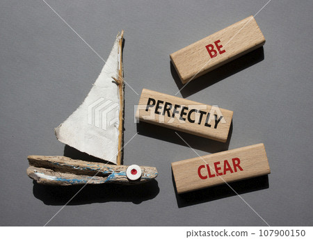 Be perfectly clear symbol. Concept words Be perfectlyclear on wooden blocks. Beautiful grey background with boat. Business and Be perfectly clear concept. Copy space Be perfectly clear symbol. Concept words Be perfectlyclear on wooden blocks. Beautiful grey background with boat. Business and Be perfectly clear concept. Copy space 107900150