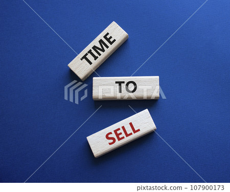 Time to Sell symbol. Concept words Time to Sell on wooden blocks. Beautiful deep blue background. Business and Time to Sell concept. Copy space. Time to Sell symbol. Concept words Time to Sell on wooden blocks. Beautiful deep blue background. Business and Time to Sell concept. Copy space. 107900173