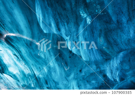 Iceland. Ice as a background. Vatnajokull National Park. Inside view of the ice cave. Iceland. Ice as a background. Vatnajokull National Park. Inside view of the ice cave. 107900385