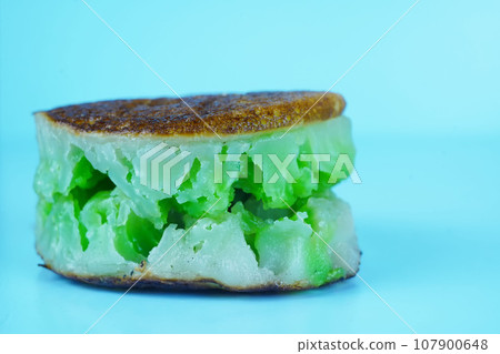 Bikang is a traditional Indonesian cake made with tapioca flour, coconut milk, sugar, and yeast. Bikang is a traditional Indonesian cake made with tapioca flour, coconut milk, sugar, and yeast. 107900648