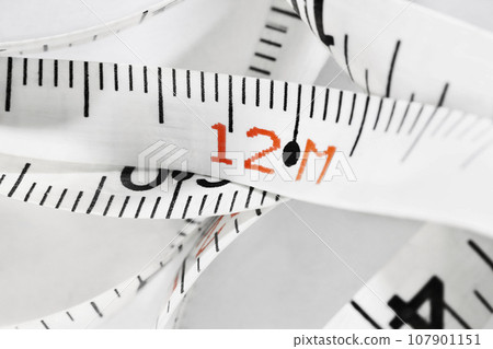 Measuring tape with number 12 Measuring tape with number 12 107901151