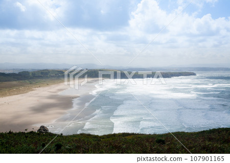 Xago beach view. Asturias coastline panorama, Spain Xago beach view. Asturias coastline panorama, Spain 107901165