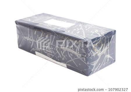 Closed and taped cardboard box 107902327