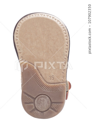 sole of children's shoes isolated on white background sole of children's shoes isolated on white background 107902350