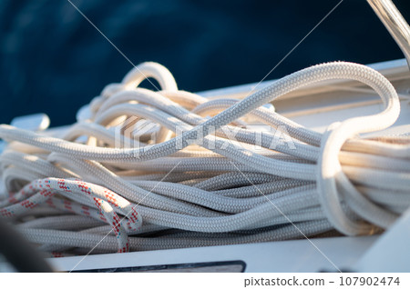 Close up of a rope on a yacht deck 107902474