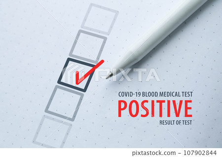 Medical blood test for covid-19, positive test result. Test mark. 107902844