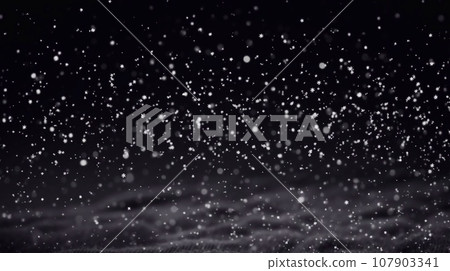 Snowfall on a black background. Snowflakes fly in the air. 107903341