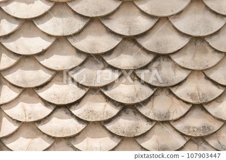 concrete wall, fish-scale design resembling Japanese koi Guotaku 107903447